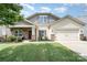 Charming single-Gathering home with a well-manicured lawn, inviting front porch, and two-car garage at 1244 Tranquil Falls Ln, Matthews, NC 28104