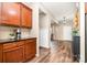 Bright hallway with hardwood floors, stylish decor, and smooth transitions at 1244 Tranquil Falls Ln, Matthews, NC 28104