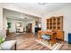 Open-concept living room featuring hardwood floors and natural light at 1244 Tranquil Falls Ln, Matthews, NC 28104