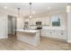 Eat-in kitchen with a large island and stainless appliances at 12744 Susanna Dr, Charlotte, NC 28214