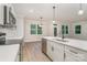 A kitchen with an island and stainless dishwasher at 12744 Susanna Dr, Charlotte, NC 28214