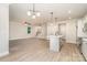 Open-concept eat-in kitchen and living room at 12744 Susanna Dr, Charlotte, NC 28214