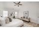 Bright main bedroom with high ceilings, stylish decor, and comfortable seating area at 12744 Susanna Dr, Charlotte, NC 28214