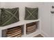Charming mudroom featuring built in storage, shelves, baskets and decorative pillows at 12744 Susanna Dr, Charlotte, NC 28214