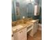 A bathroom featuring double sinks, granite countertops, and a shower curtain at 1326 5Th Ne St, Hickory, NC 28601