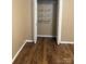 Bedroom closet with wire shelving and vinyl flooring at 1326 5Th Ne St, Hickory, NC 28601