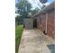 Brick house exterior with storage shed and concrete patio at 1326 5Th Ne St, Hickory, NC 28601