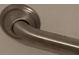 A close-up shot of a handrail attached to the shower walls at 1326 5Th Ne St, Hickory, NC 28601