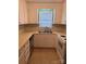 Functional kitchen featuring white cabinets and countertops plus modern appliances including dishwasher and range at 1326 5Th Ne St, Hickory, NC 28601