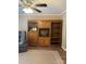 Comfortable living room featuring built-in wooden shelving with drawers and cabinets at 1326 5Th Ne St, Hickory, NC 28601