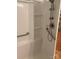 Modern shower with handrails and an adjustable shower head at 1326 5Th Ne St, Hickory, NC 28601