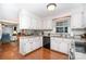Bright kitchen with white cabinets, granite countertops, and stainless steel appliances at 14027 Springwater Dr, Matthews, NC 28105