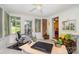 Bright and airy sunroom provides a versatile space with lots of light for relaxing or working at 14027 Springwater Dr, Matthews, NC 28105