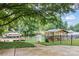 Home's backyard features a beautiful view of lake-living with a dock and covered boat slip at 147 Bluewing Ln # 274, Mooresville, NC 28117