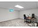 Finished basement with carpet, an office area with a desk, chair, and window at 147 Bluewing Ln # 274, Mooresville, NC 28117