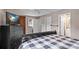 Spacious bedroom with a ceiling fan, TV, and a gray and white patterned quilt at 147 Bluewing Ln # 274, Mooresville, NC 28117