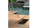 Dock features a blue heron standing on the edge of a wooden dock at 147 Bluewing Ln # 274, Mooresville, NC 28117