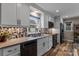 Modern kitchen featuring updated cabinets, granite countertops and stainless steel appliances at 147 Bluewing Ln # 274, Mooresville, NC 28117