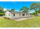 The rear of the property with a concrete patio and a well-maintained lawn at 1501 E Church St, Cherryville, NC 28021