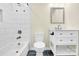 Modern bathroom featuring a white subway tile shower and a vanity with a marble countertop at 1501 E Church St, Cherryville, NC 28021