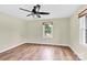 Neutral bedroom features hardwood floors, one window and a ceiling fan at 1501 E Church St, Cherryville, NC 28021