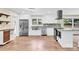 Modern white kitchen boasts stainless steel appliances and granite countertops at 1501 E Church St, Cherryville, NC 28021