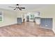 Open-concept living room with kitchen view and hardwood floors at 1501 E Church St, Cherryville, NC 28021