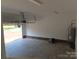 Attached garage with an automatic door and water heater provides convenient parking at 153 Mason Tanner Ct, Rock Hill, SC 29730