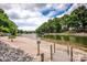 Sandy beach access on the lake, complete with a small dock and boat launch at 19901 Henderson Rd # M, Cornelius, NC 28031