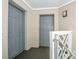 Common hallway featuring two neutral-colored doors and carpeted floor at 19901 Henderson Rd # M, Cornelius, NC 28031