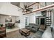 Open floor plan with great room, spiral staircase, dining area and loft at 19901 Henderson Rd # M, Cornelius, NC 28031