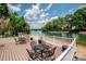 Community deck overlooking the lake with tables and chairs for residents to enjoy at 19901 Henderson Rd # M, Cornelius, NC 28031