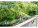 Serene waterfront view from the home showing a canal with green trees at 19901 Henderson Rd # M, Cornelius, NC 28031