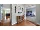 Inviting entryway featuring hardwood floors, stylish decor, and open access to living spaces at 2017 White Cedar Ln, Waxhaw, NC 28173