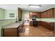 Clean kitchen featuring stainless steel appliances, ample cabinet space, and a view into dining room at 2017 White Cedar Ln, Waxhaw, NC 28173