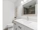 This bathroom includes a white vanity, an oversized mirror, and tiled shower at 232 Scottridge Dr, Charlotte, NC 28217