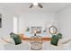 Charming living room with a white brick fireplace, hardwood floors, and comfortable seating at 232 Scottridge Dr, Charlotte, NC 28217
