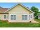 This charming home boasts a well-maintained backyard with lush green grass at 2323 Granville Pl # A, Monroe, NC 28110