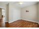 Bedroom featuring a closet and hardwood floors, providing a comfortable and functional space at 2323 Granville Pl # A, Monroe, NC 28110