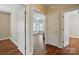 Bright bedroom features wood floors and neutral paint, creating a serene and inviting atmosphere at 2323 Granville Pl # A, Monroe, NC 28110