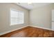 Cozy bedroom featuring a large window providing natural light and ample space at 2323 Granville Pl # A, Monroe, NC 28110