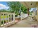 Relaxing front porch with rocking chair, offering a tranquil view of the neighborhood at 2323 Granville Pl # A, Monroe, NC 28110