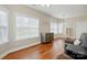 Bright open living room with hardwood floors connected to dining area at 2323 Granville Pl # A, Monroe, NC 28110