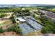 Aerial view of a community pool, tennis courts and golf course at 2485 Shanklin Ln, Denver, NC 28037
