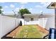 Fenced backyard with grass and stepping stones at 2485 Shanklin Ln, Denver, NC 28037