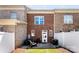 Brick townhome featuring a private patio and fenced yard at 2485 Shanklin Ln, Denver, NC 28037