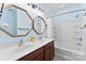 Bathroom features a double sink vanity, tub, shower and two octagon-shaped mirrors at 2485 Shanklin Ln, Denver, NC 28037