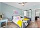 Bedroom features a sliding barn door to the bathroom and stylish decor at 2485 Shanklin Ln, Denver, NC 28037