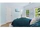 Bedroom features one window and a TV hanging on the wall at 2485 Shanklin Ln, Denver, NC 28037