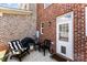 Cozy brick patio with outdoor seating and grill at 2485 Shanklin Ln, Denver, NC 28037